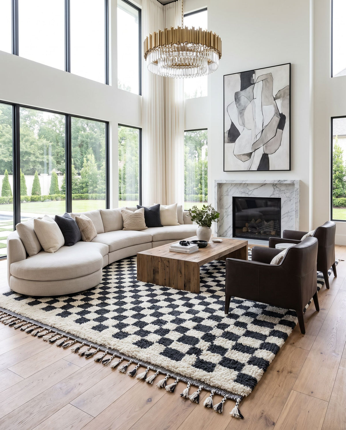 Mirela MMI-2301 Hand Woven Rug as the centerpiece of a bright luxury living room — a hand woven transitional, bohemian area rug in charcoal and ivory tones