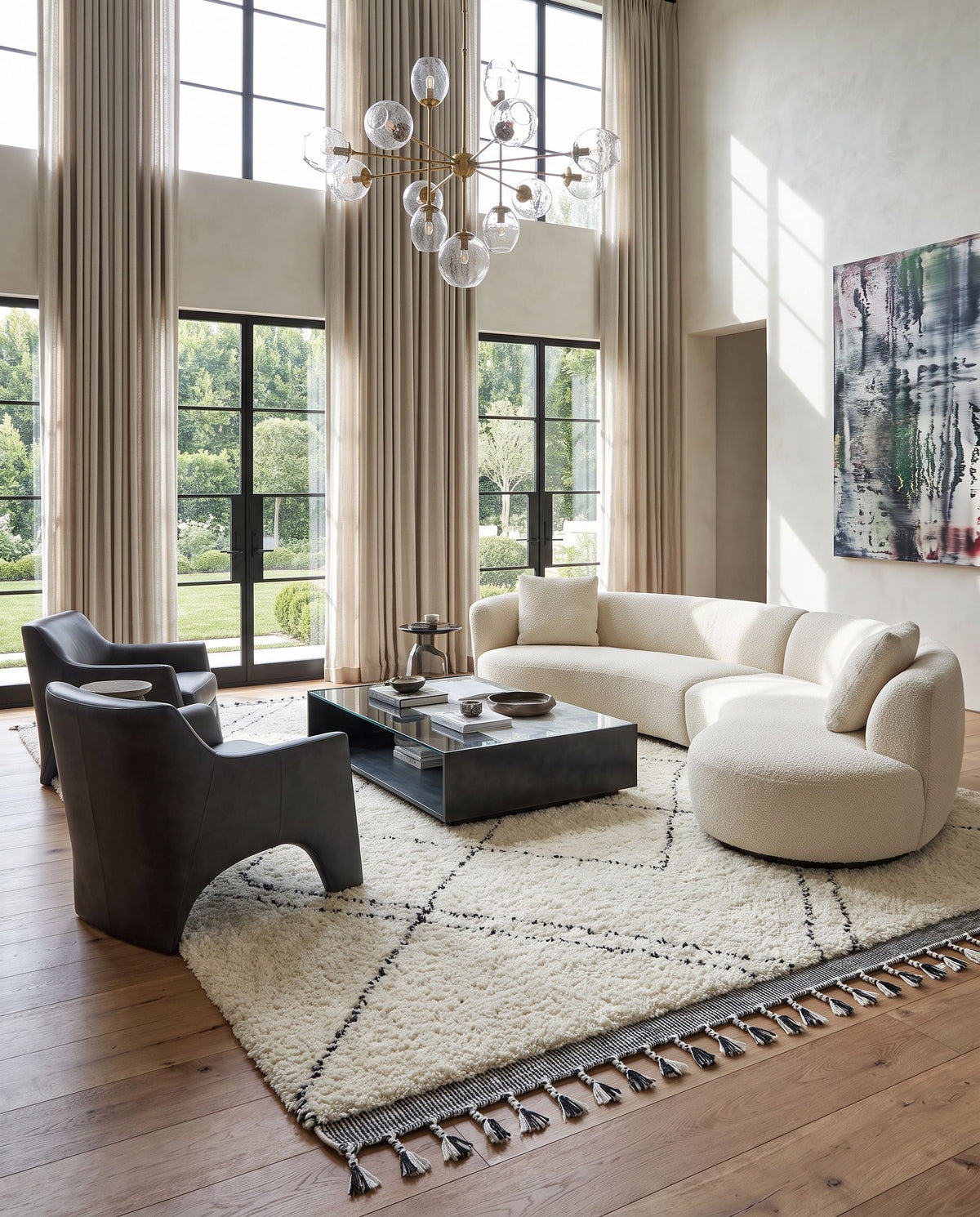 Mirela MMI-2302 Hand Woven Rug as the centerpiece of a bright luxury living room — a hand woven transitional, bohemian area rug in ivory, charcoal and slate gray tones