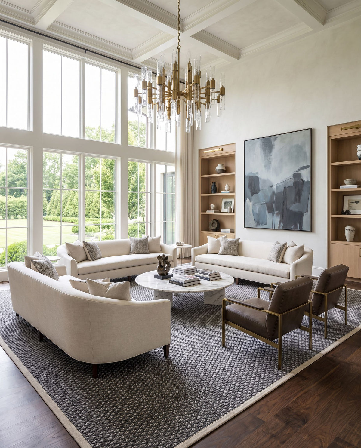 Modena MOE-1000 Hand Woven Rug as the centerpiece of a bright luxury living room — a hand woven modern area rug in light gray, charcoal and cream tones