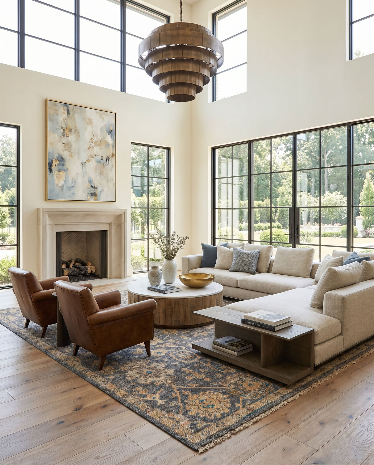 Monterey MOY-2301 Hand Knotted Rug as the centerpiece of a bright luxury living room — a hand knotted traditional area rug in charcoal, gray, tan and wheat tones