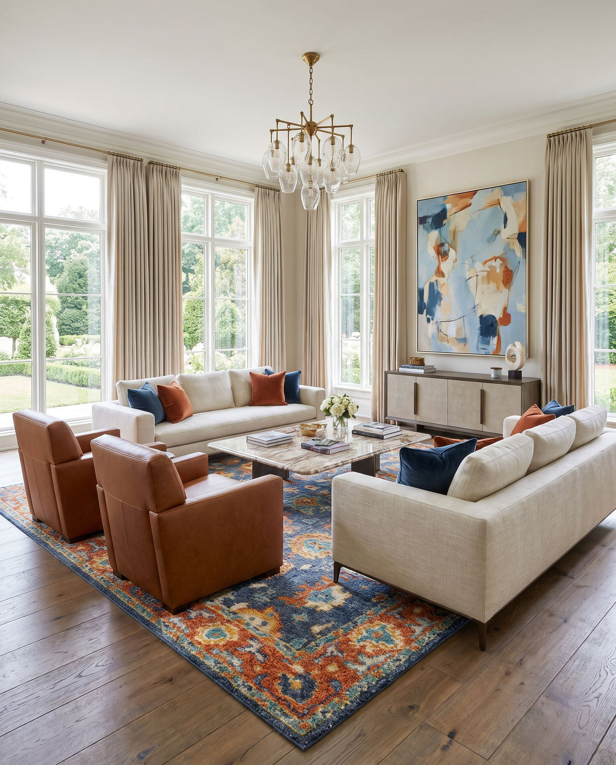 Marrakech MRK-2303 Hand Knotted Rug styled in an elegant designer living room — hand knotted traditional area rug in burnt orange, dusty coral, rust and dark blue tones