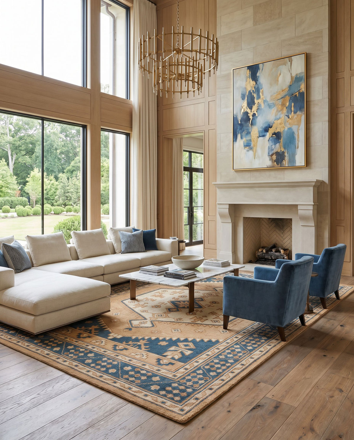 Milas MSL-2300 Hand Knotted Rug as the centerpiece of a bright luxury living room — a hand knotted traditional area rug in camel, burnt orange, beige and dark blue tones