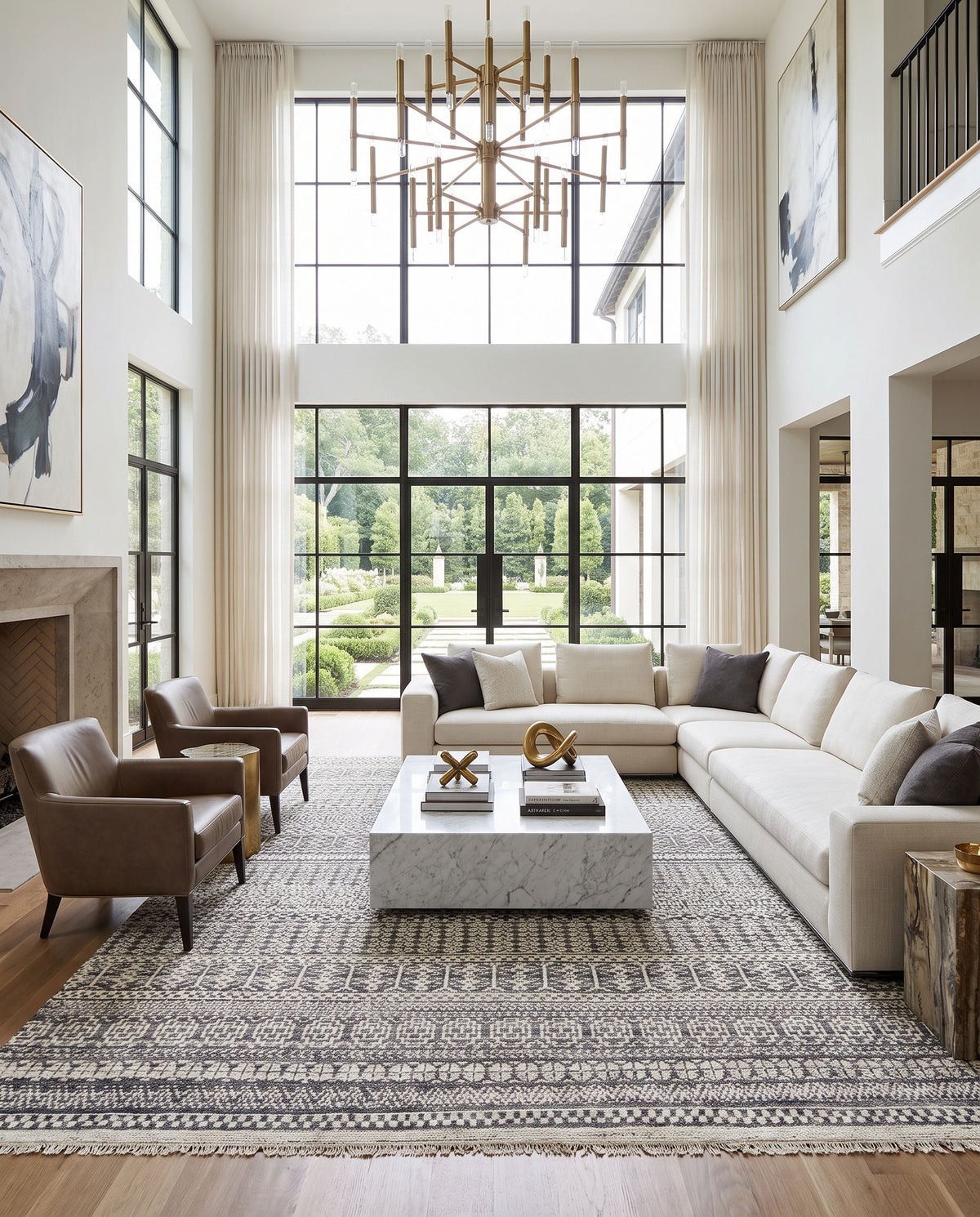 Nobility NBI-2308 Hand Knotted Rug as the centerpiece of a bright luxury living room — a hand knotted global area rug in dusty sage, oatmeal, light gray and charcoal tones