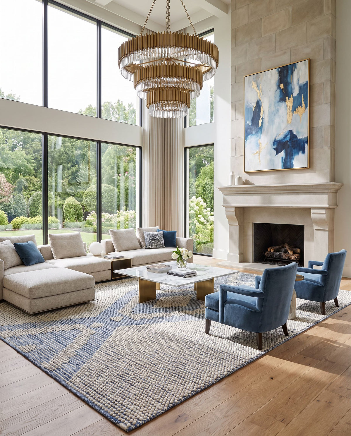 Nadine NDD-2303 Hand Woven Rug as the centerpiece of a bright luxury living room — a hand woven global area rug in beige, ivory and blue tones