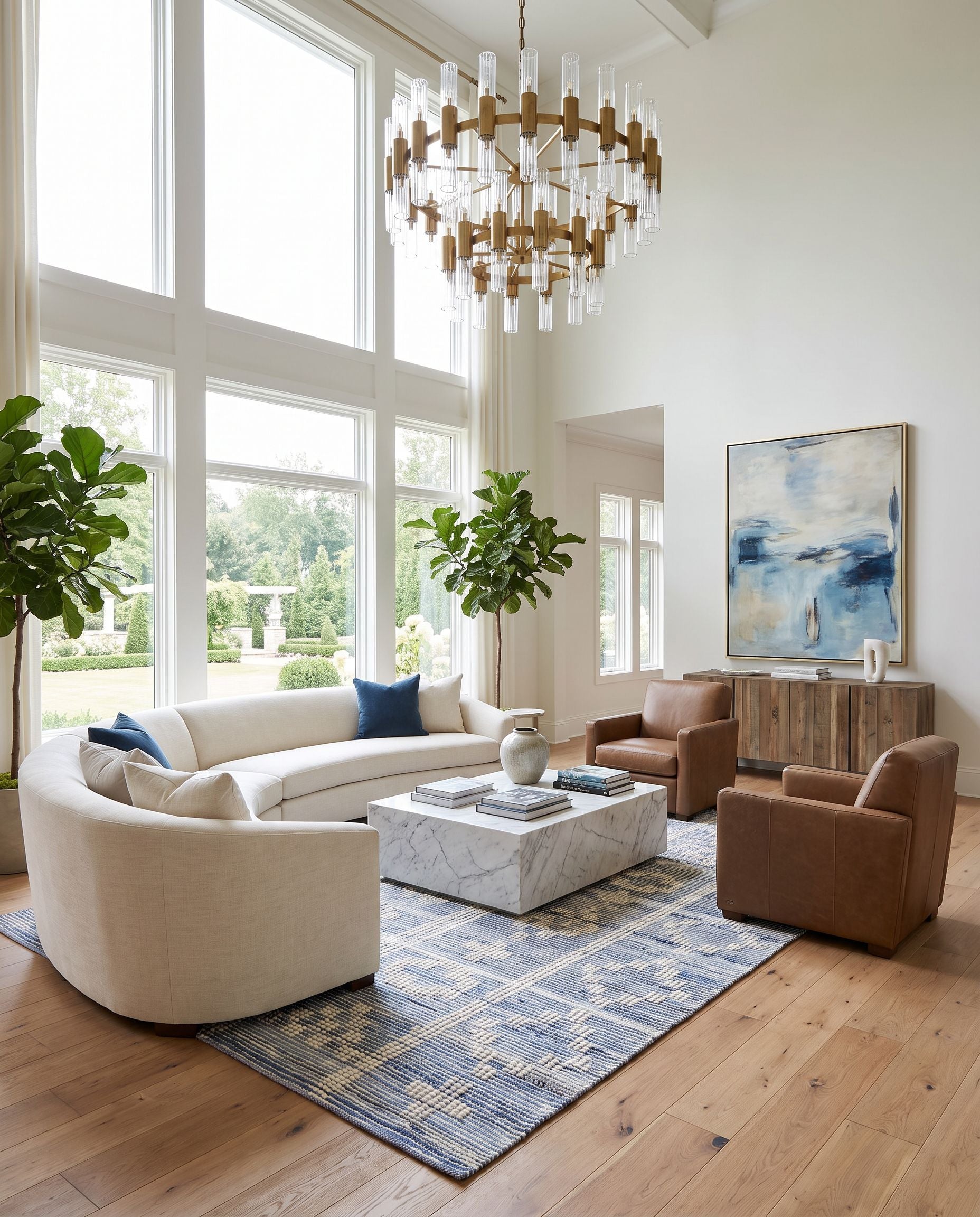 Nadine NDD-2304 Hand Woven Rug as the centerpiece of a bright luxury living room — a hand woven global area rug in beige, ivory and blue tones