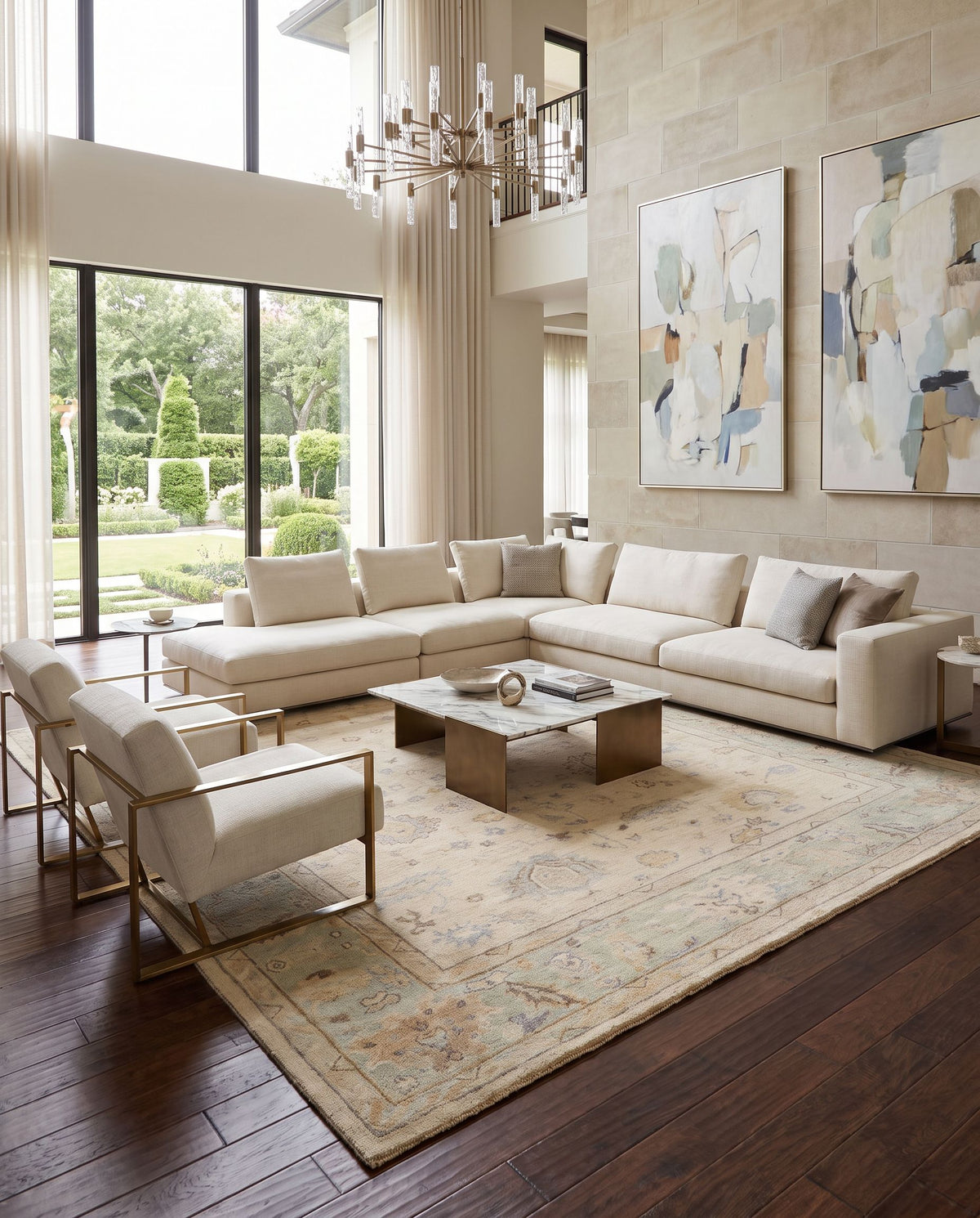 Normandy NOY-8010 Hand Knotted Rug as the centerpiece of a bright luxury living room — a hand knotted traditional area rug in denim, beige, yellow and sage tones