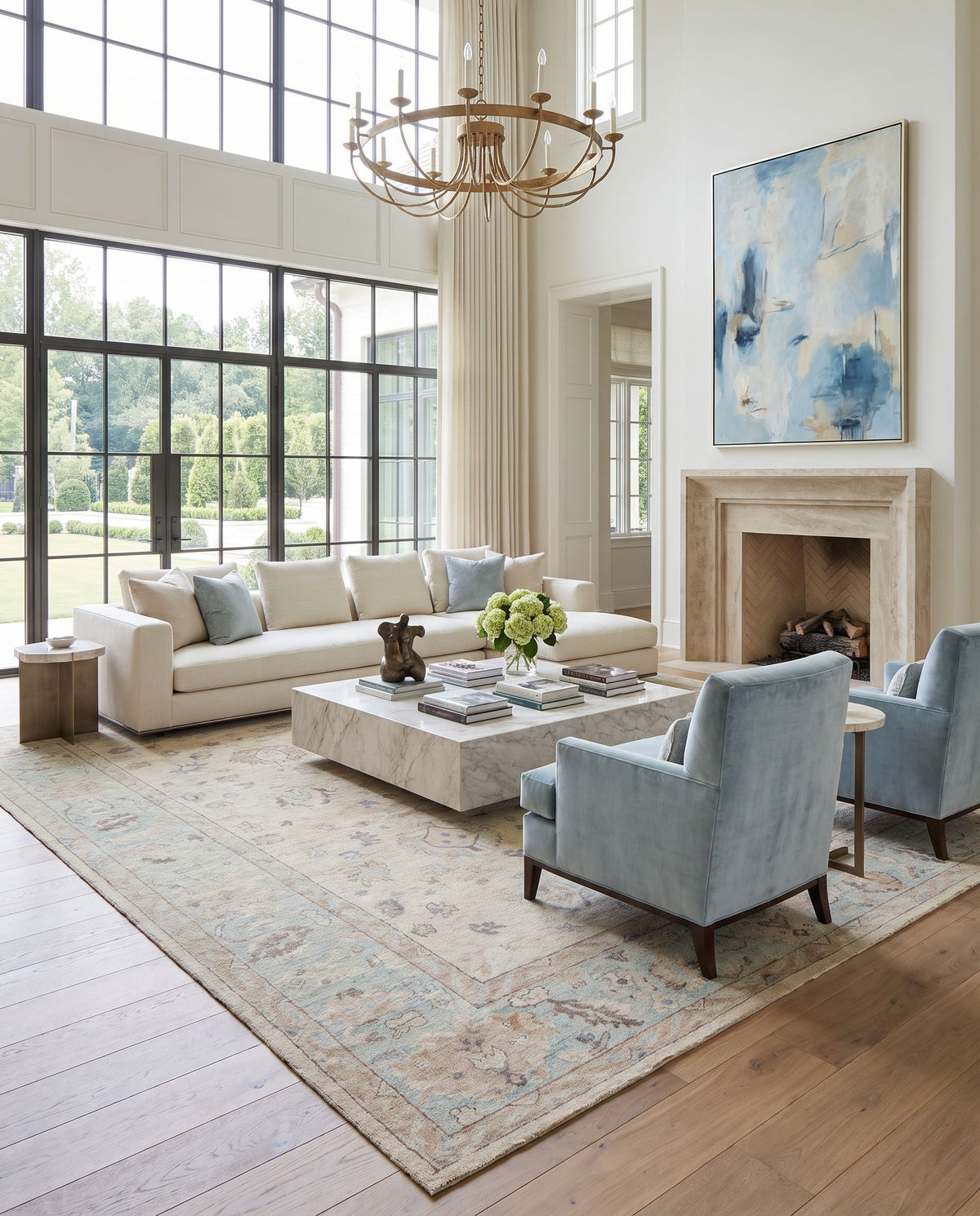 Normandy NOY-8010 Hand Knotted Rug styled in an elegant designer living room — hand knotted traditional area rug in denim, beige, yellow and sage tones