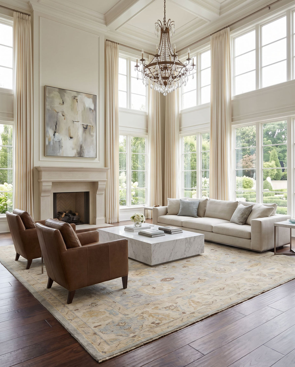 Normandy NOY-8011 Hand Knotted Rug as the centerpiece of a bright luxury living room — a hand knotted traditional area rug in oatmeal, taupe, pale blue and blue tones