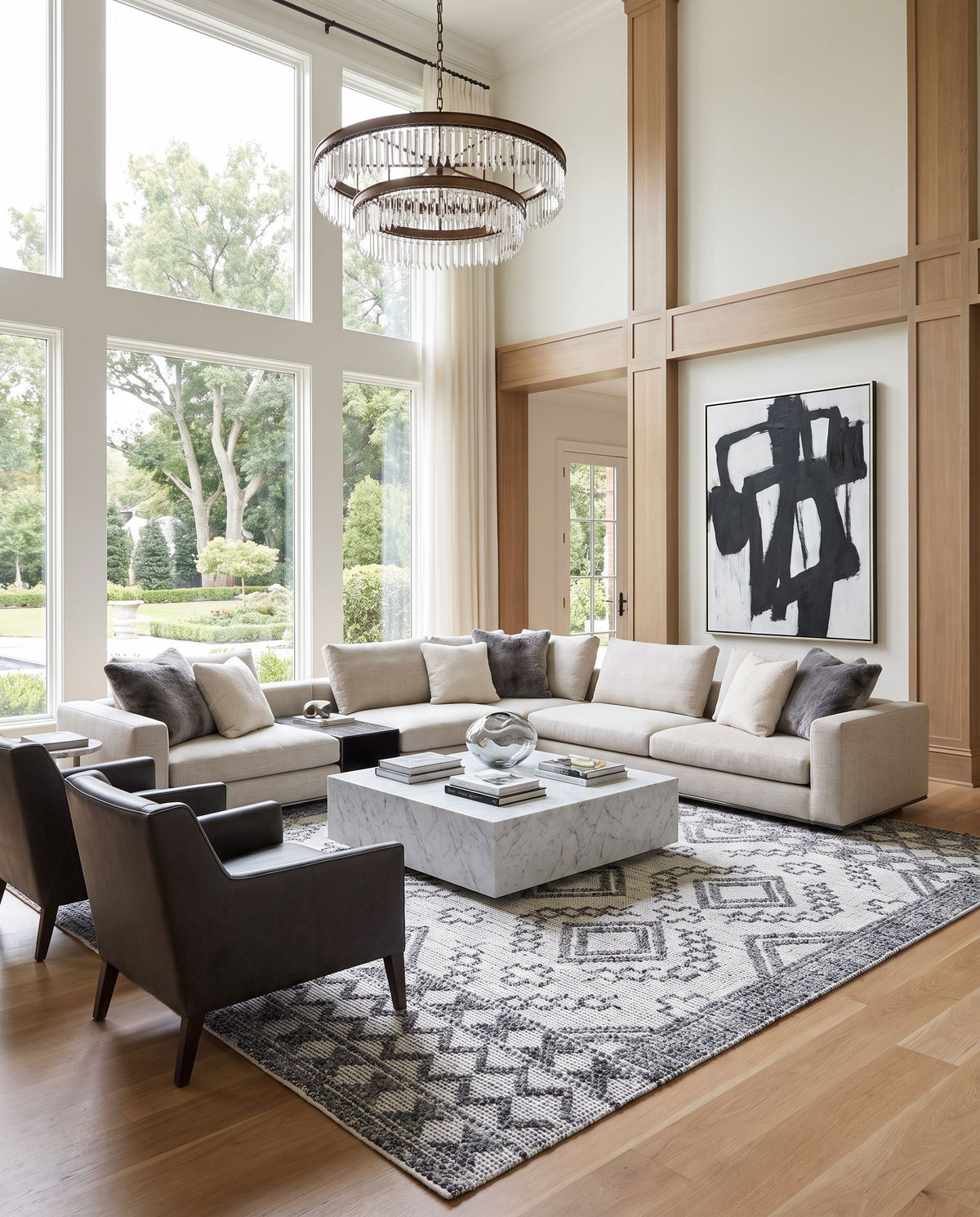 Napoli NPO-2304 Hand Woven Rug as the centerpiece of a bright luxury living room — a hand woven global area rug in beige, brown and tan tones