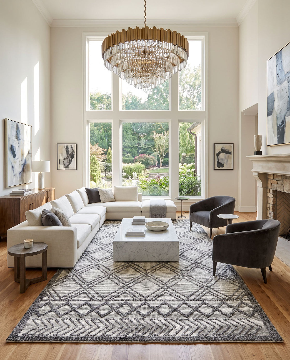 Napoli NPO-2309 Hand Woven Rug as the centerpiece of a bright luxury living room — a hand woven global area rug in white, light slate, black and gray tones