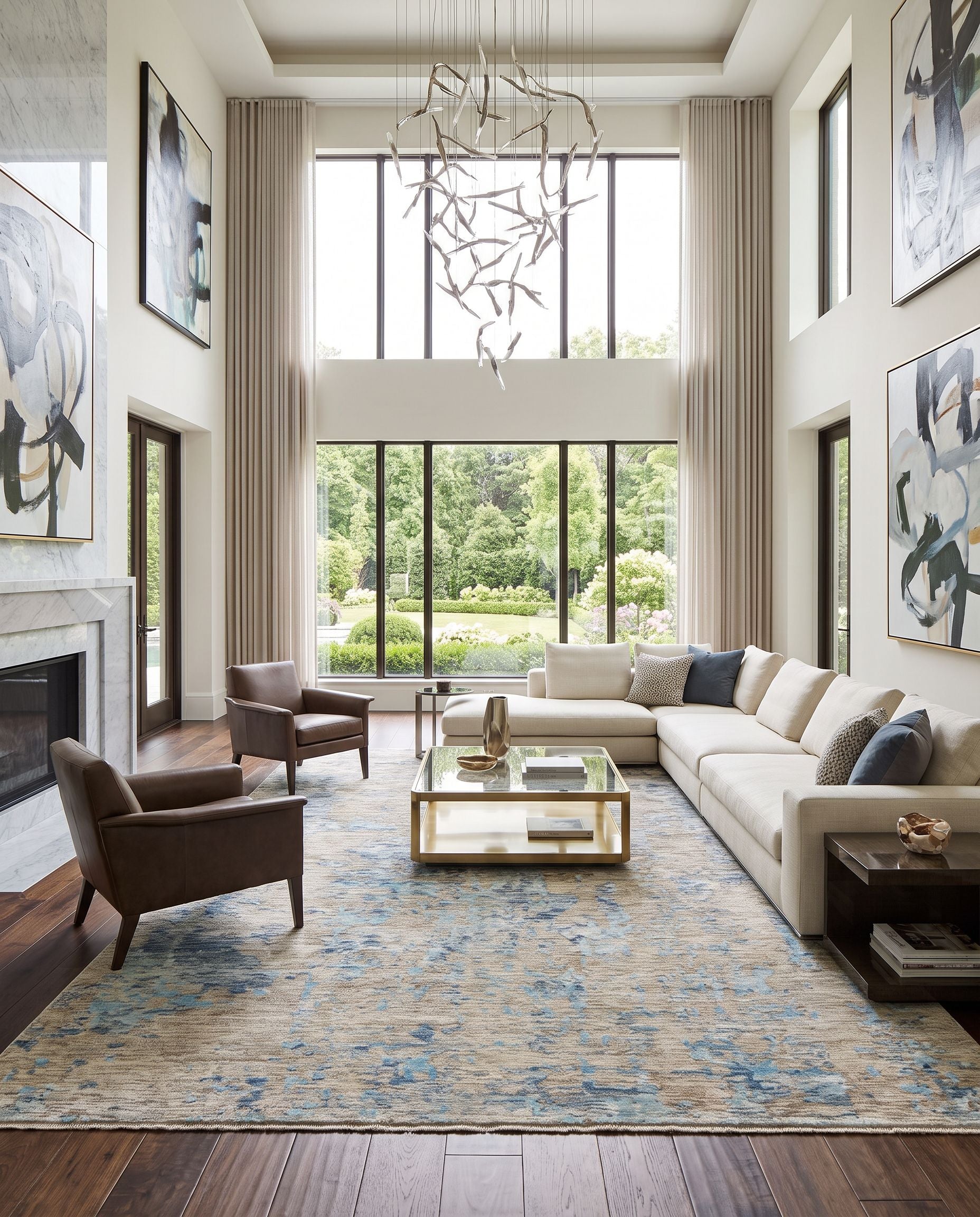 Ocean OCE-2301 Hand Knotted Rug as the centerpiece of a bright luxury living room — a hand knotted modern area rug in blue, ice blue, taupe and light gray tones