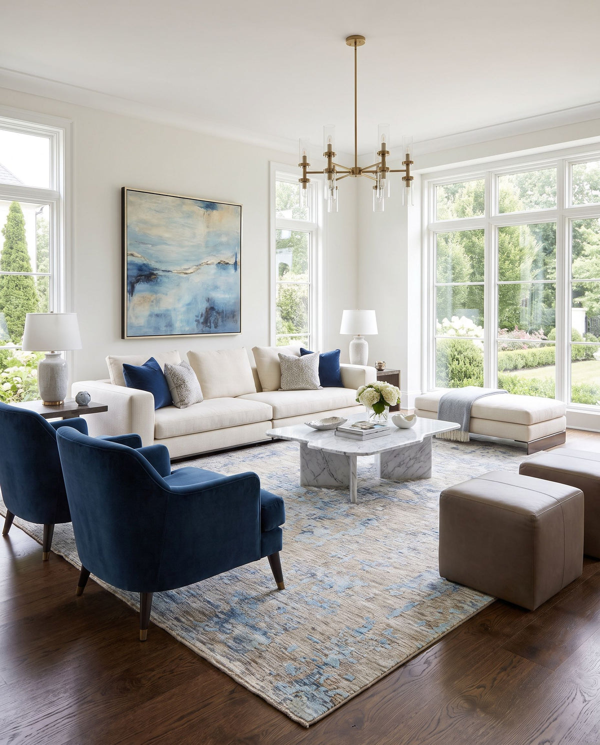 Ocean OCE-2301 Hand Knotted Rug styled in an elegant designer living room — hand knotted modern area rug in blue, ice blue, taupe and light gray tones