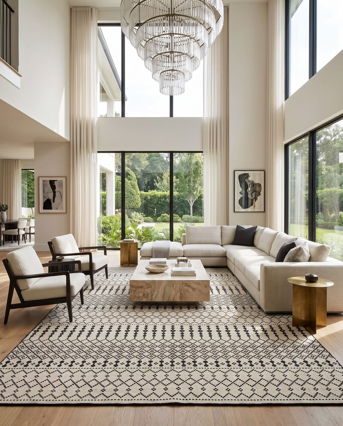Osasuna OSA-2300 Hand Woven Rug as the centerpiece of a bright luxury living room — a hand woven rustic area rug in black and beige tones