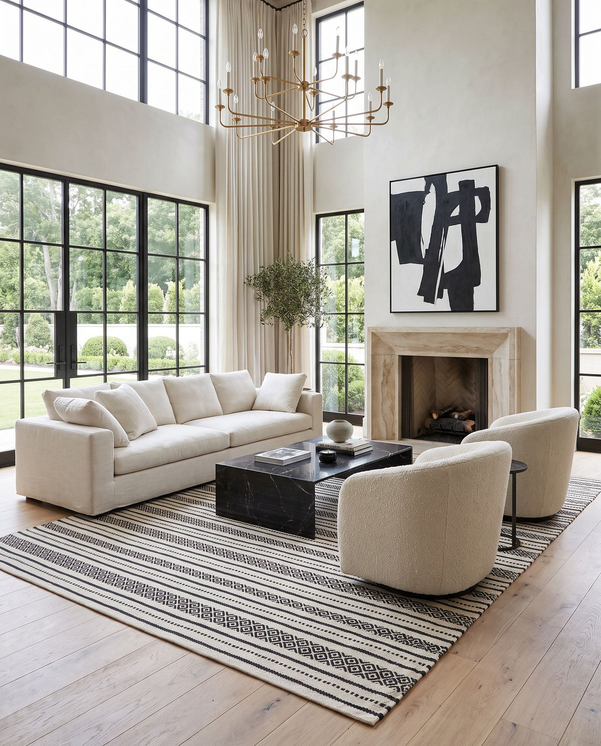 Osasuna OSA-2304 Hand Woven Rug as the centerpiece of a bright luxury living room — a hand woven rustic area rug in black and beige tones