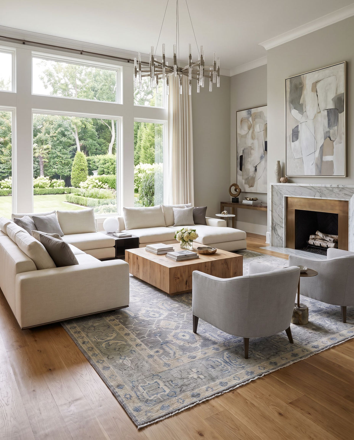 Palais PAL-2307 Hand Knotted Rug styled in an elegant designer living room — hand knotted traditional area rug in gray, medium gray, ivory and seafoam tones