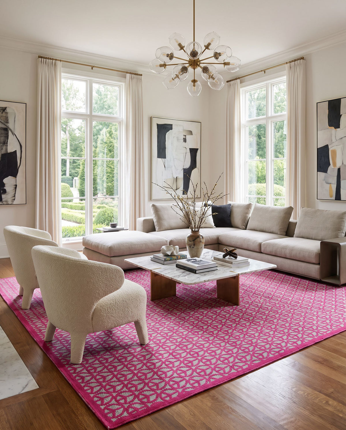 Peace PCE-1000 Hand Woven Rug styled in an elegant designer living room — hand woven contemporary area rug in fuchsia and light sage tones