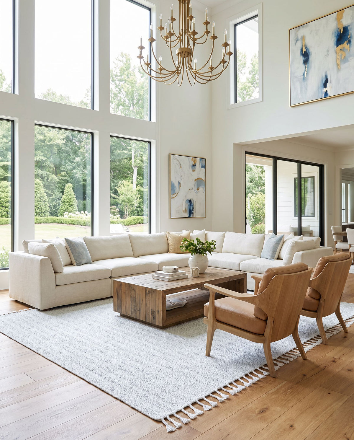 Peony PON-2305 Hand Woven Rug as the centerpiece of a bright luxury living room — a hand woven transitional, traditional area rug in powder blue, soft gray and ivory tones