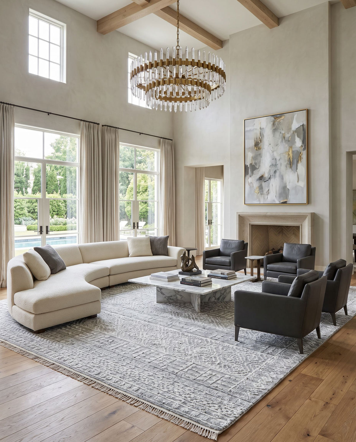 Pompei PPI-2304 Hand Knotted Rug as the centerpiece of a bright luxury living room — a hand knotted rustic area rug in charcoal, black, white and light slate tones