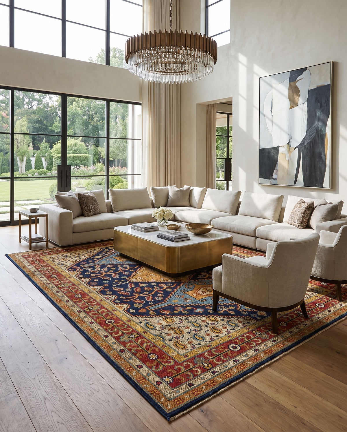 Reign REG-2300 Hand Knotted Rug as the centerpiece of a bright luxury living room — a hand knotted traditional area rug in navy, tan, beige and rust tones