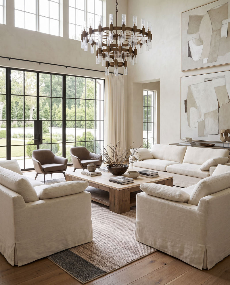 Reika REK-2308 Hand Woven Rug as the centerpiece of a bright luxury living room — a hand woven modern area rug in off-white, denim, light blue and light gray tones