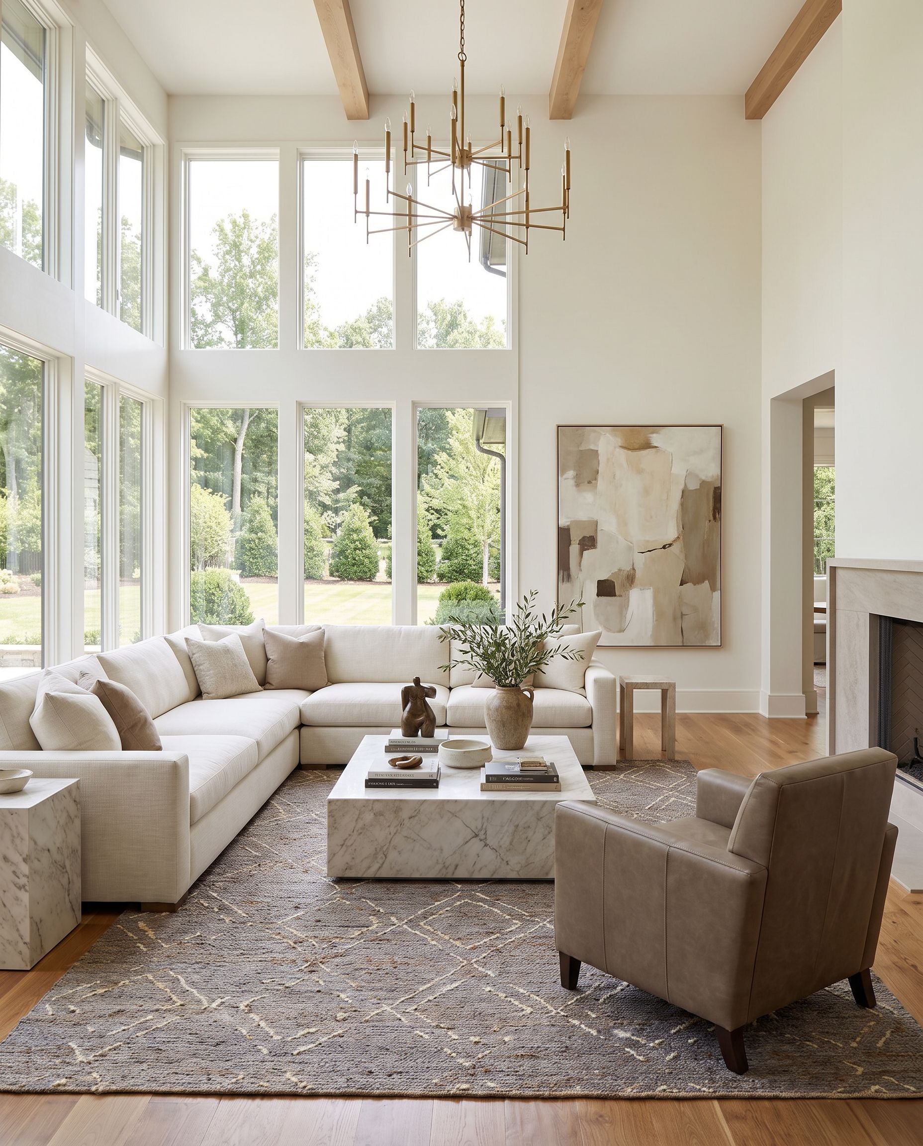 Riah RIH-2302 Hand Woven Rug as the centerpiece of a bright luxury living room — a hand woven cottage area rug in charcoal, medium gray, brown and beige tones