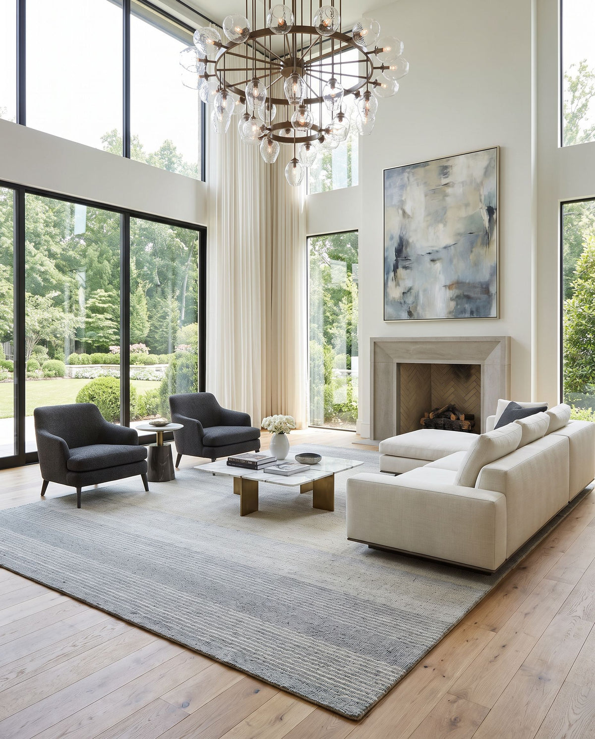Romano RMO-2303 Hand Loomed Rug as the centerpiece of a bright luxury living room — a hand loomed cottage area rug in slate gray, dove gray, ivory and charcoal tones