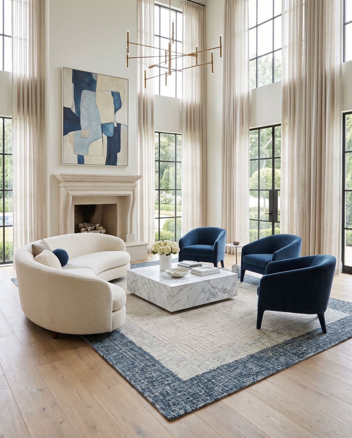 Bordighera Hand Tufted Rug styled in an elegant designer living room — hand tufted modern area rug in teal, light gray, medium gray and cream tones