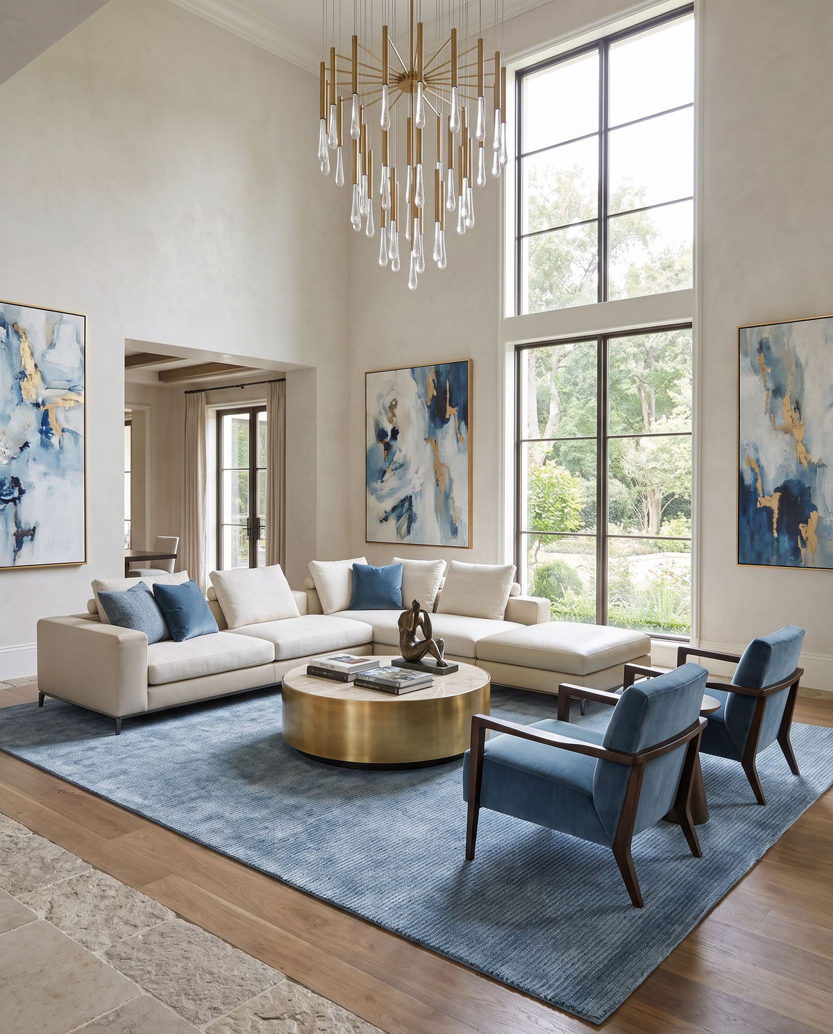 Cankiri Hand Tufted Rug as the centerpiece of a bright luxury living room — a hand tufted modern area rug in sky blue, slate and steel blue tones