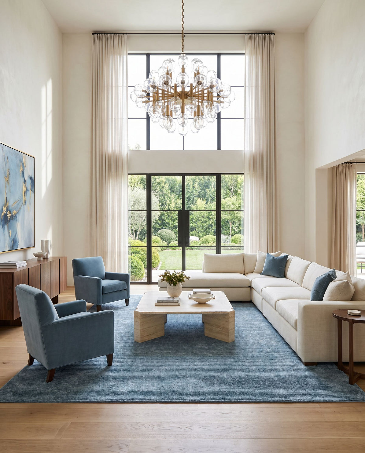 Cankiri Hand Tufted Rug styled in an elegant designer living room — hand tufted modern area rug in sky blue, slate and steel blue tones