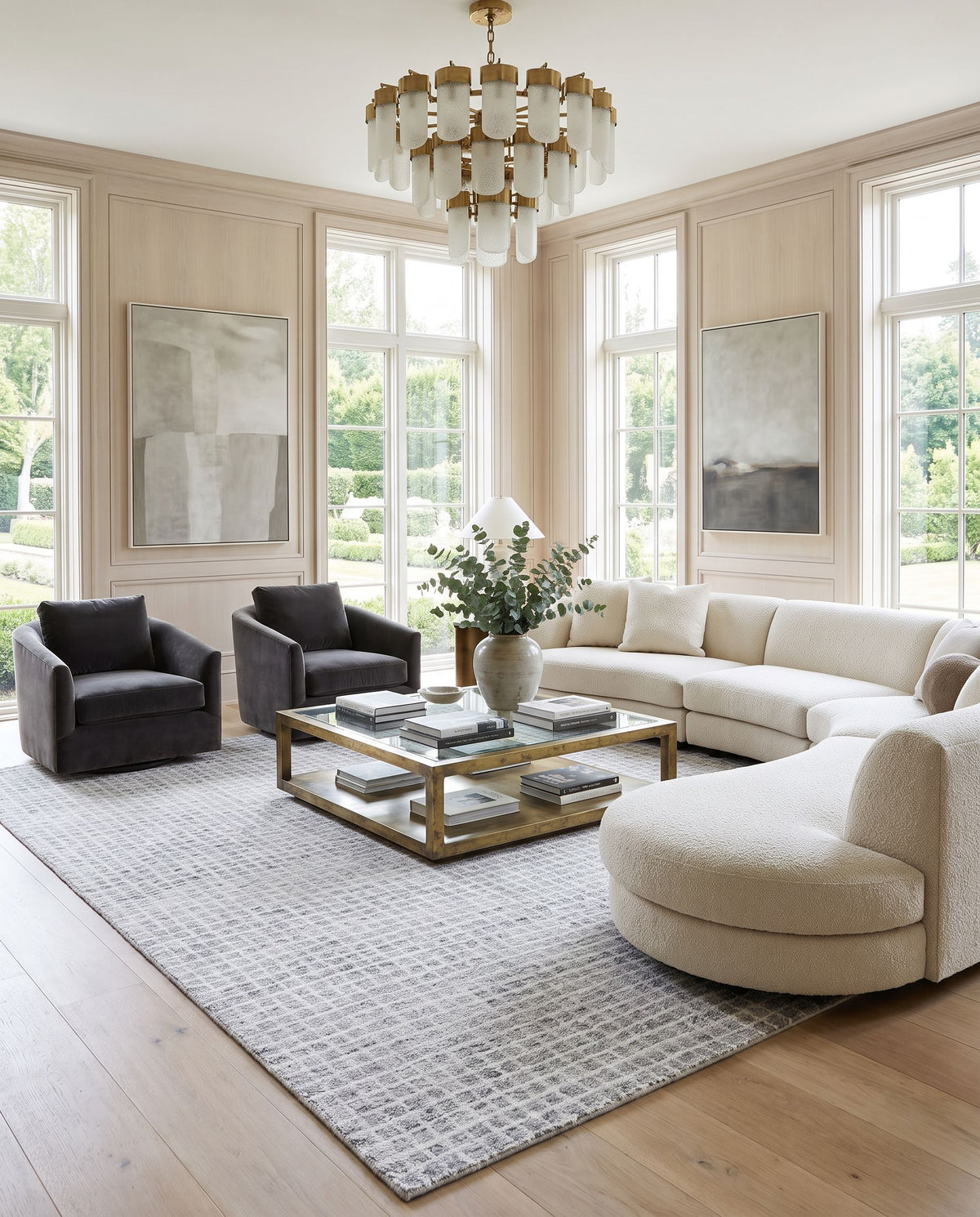 Divrigi Hand Tufted Rug styled in an elegant designer living room — hand tufted area rug in ivory, slate gray and pearl white tones