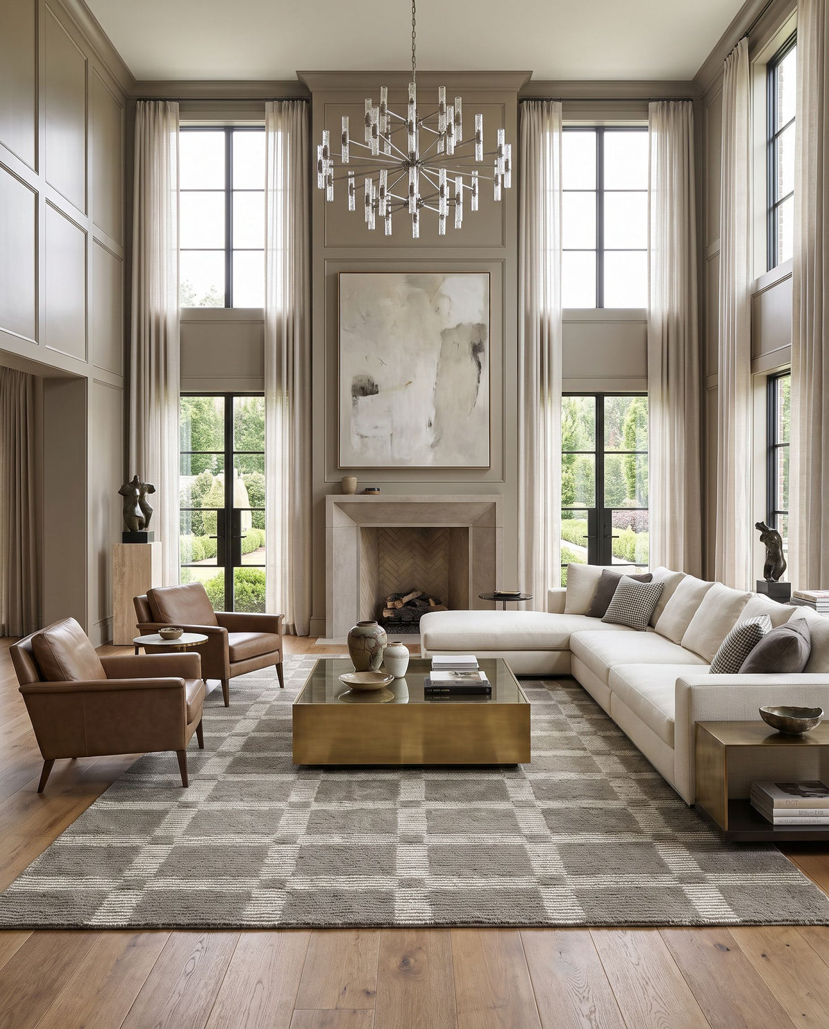 Gordes Hand Tufted Rug as the centerpiece of a bright luxury living room — a hand tufted modern area rug in warm neutral tones