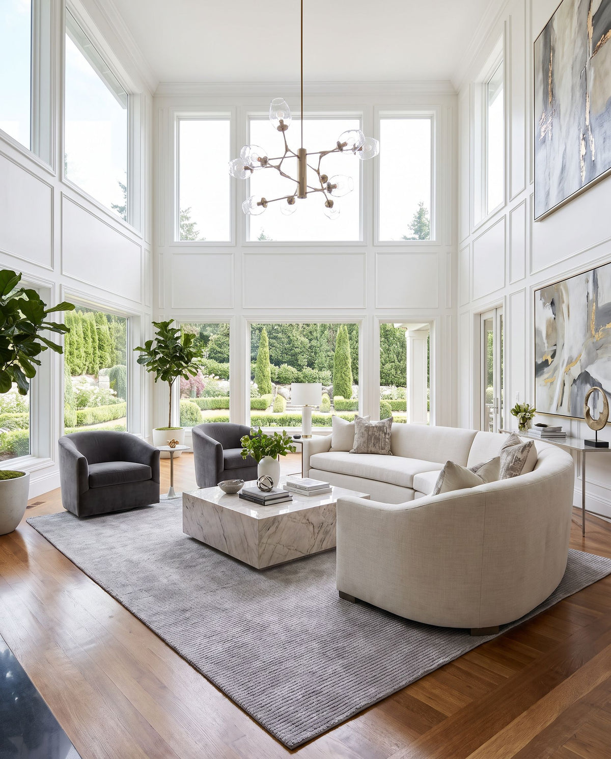 Karadeniz Hand Tufted Rug as the centerpiece of a bright luxury living room — a hand tufted modern area rug in silver, dove gray and ash tones