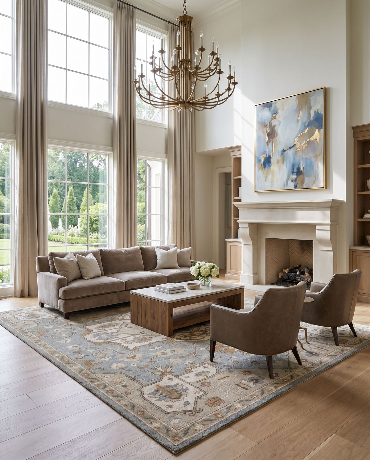 Meridian Hand Tufted Rug styled in an elegant designer living room — hand tufted traditional area rug in medium gray, beige, tan and sage tones