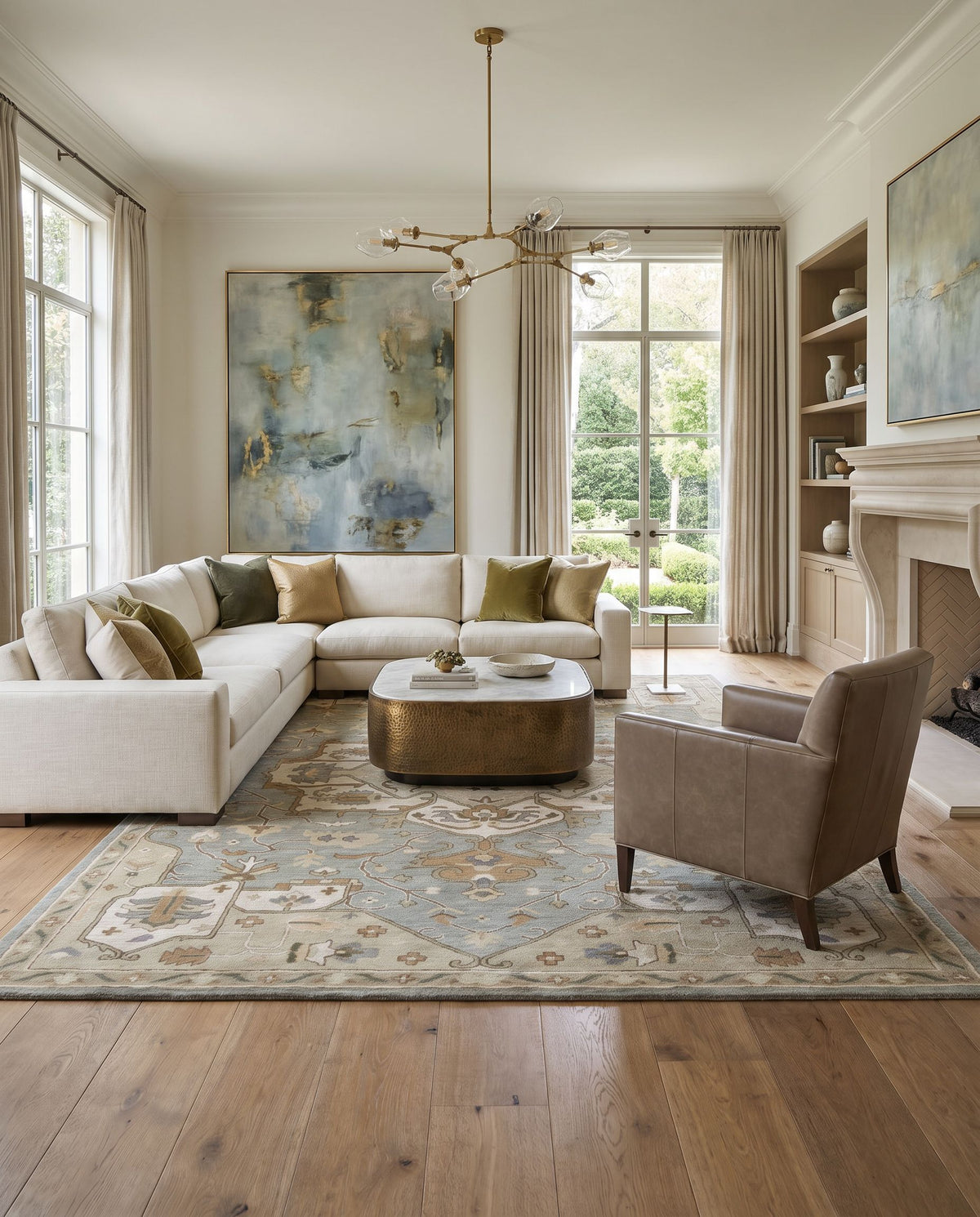 Meridian Hand Tufted Rug styled in an elegant designer living room — hand tufted traditional area rug in medium gray, beige, tan and sage tones