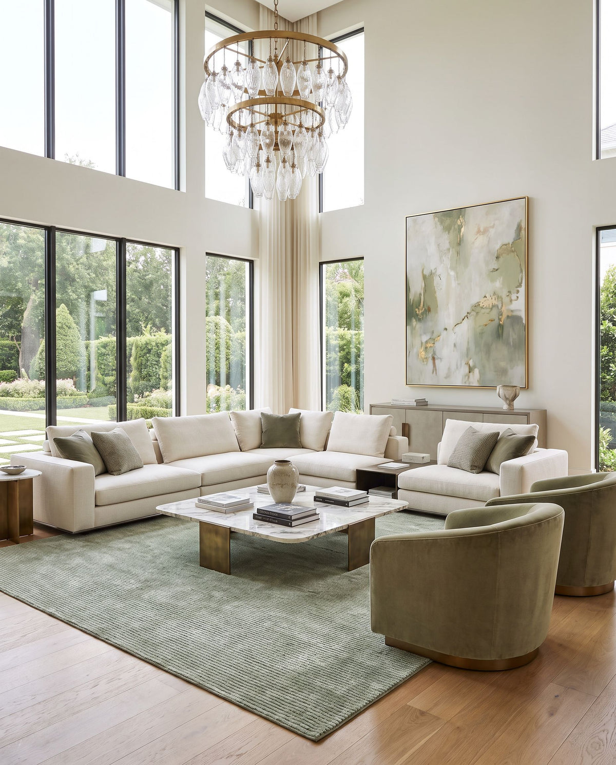 Ocotillo Hand Tufted Rug as the centerpiece of a bright luxury living room — a hand tufted modern area rug in sage green, moss and mint tones