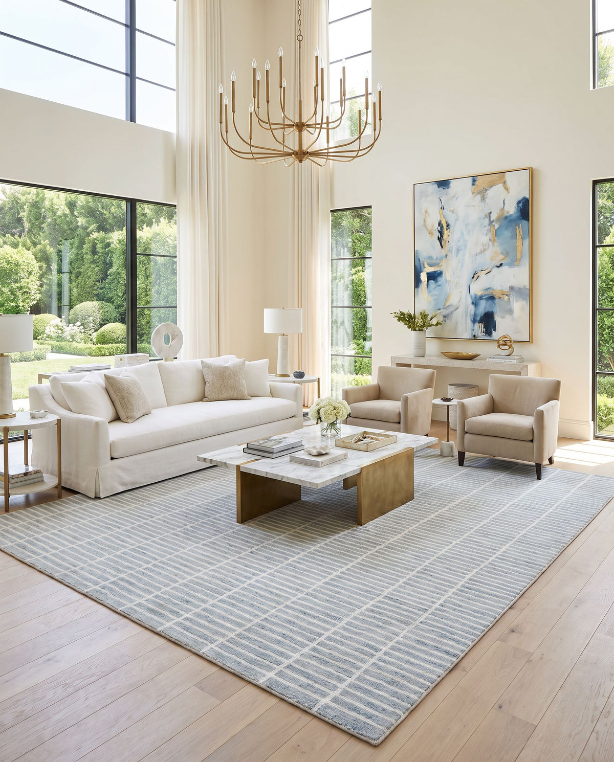 Odense Hand Tufted Rug styled in an elegant designer living room — hand tufted modern area rug in sage, slate and off-white tones