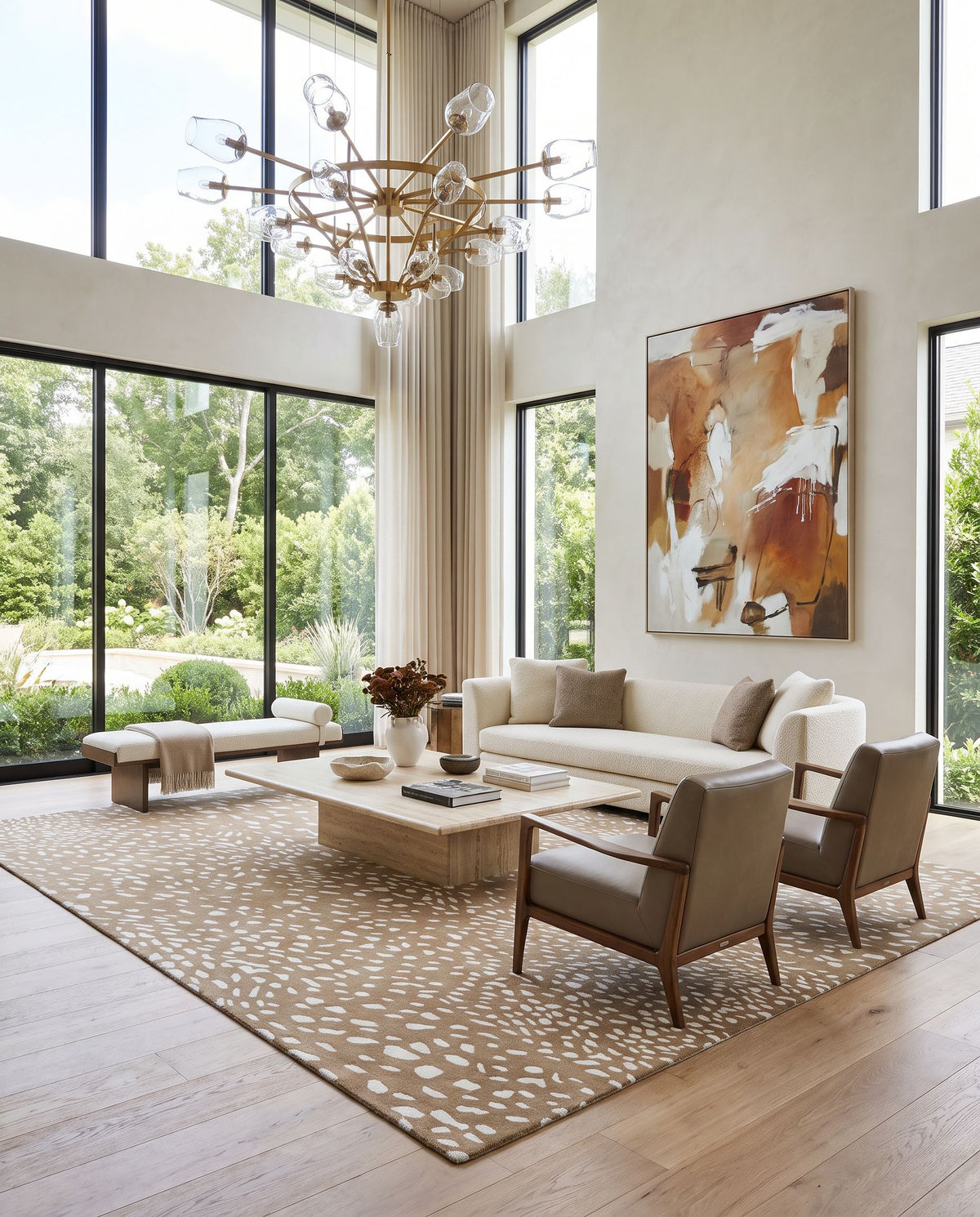 Orebro Hand Tufted Rug styled in an elegant designer living room — hand tufted modern area rug in light brown, tan and cream tones