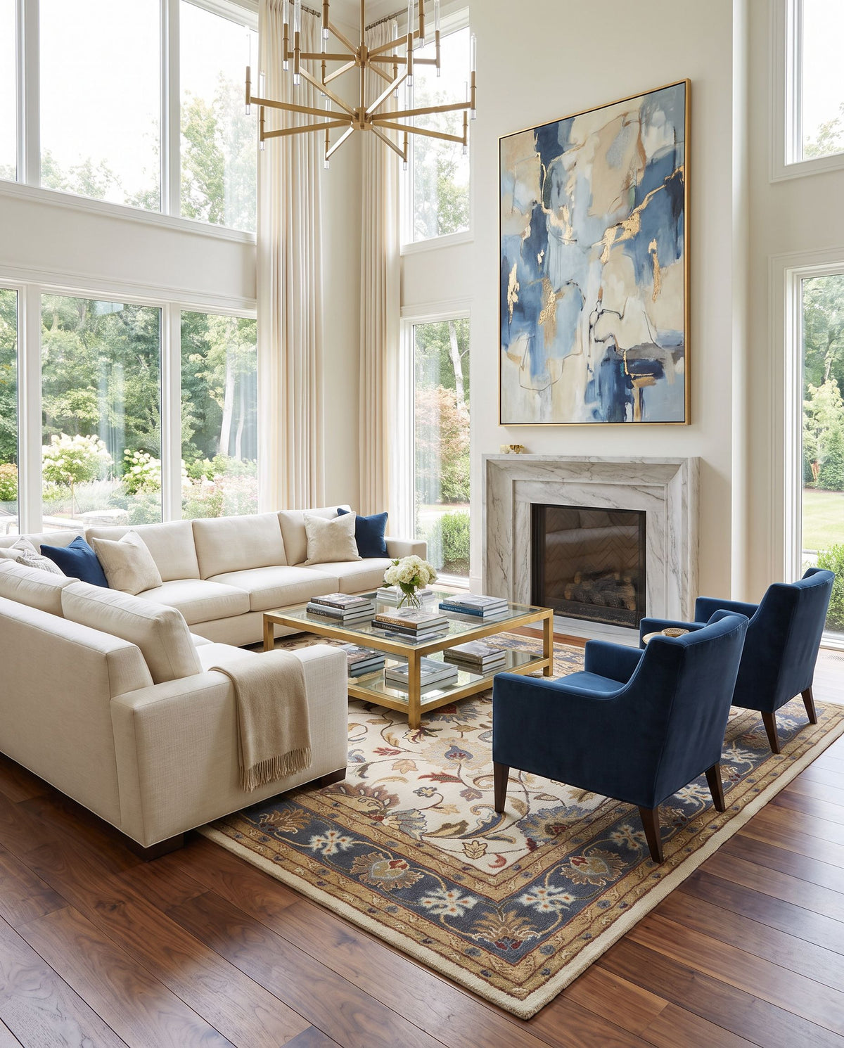 Recco Hand Tufted Rug as the centerpiece of a bright luxury living room — a hand tufted traditional area rug in dusty sage, denim, dark brown and rust tones