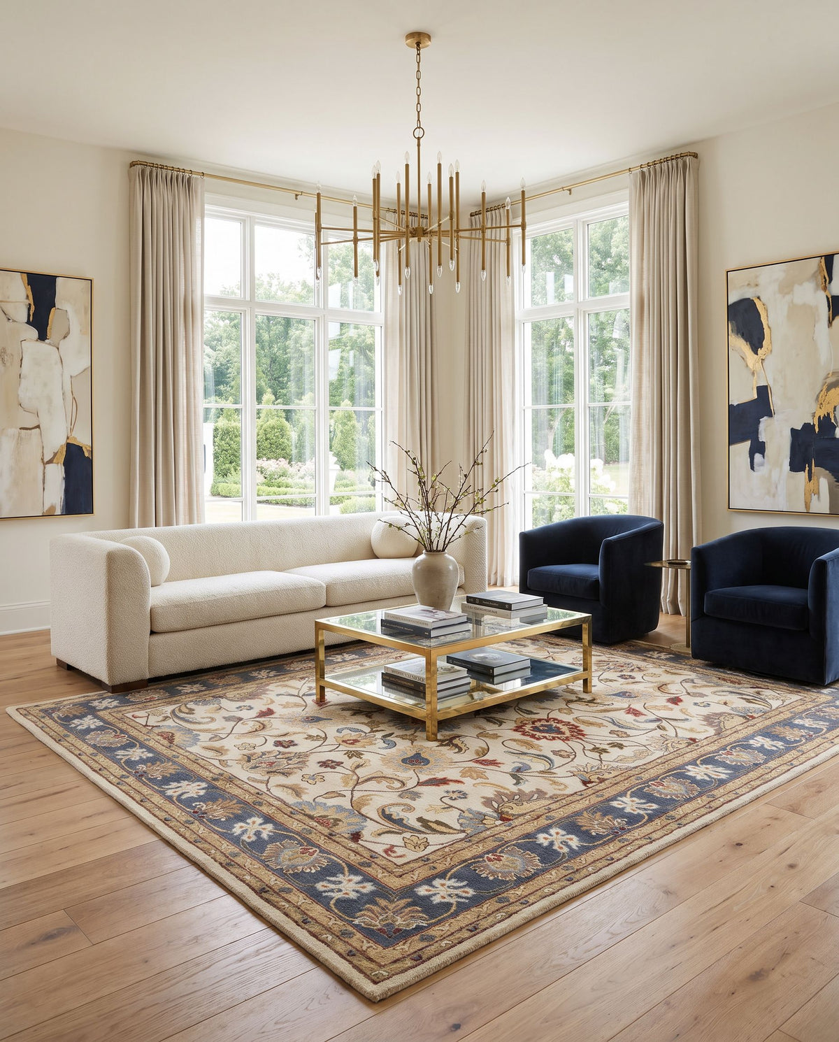 Recco Hand Tufted Rug styled in an elegant designer living room — hand tufted traditional area rug in dusty sage, denim, dark brown and rust tones