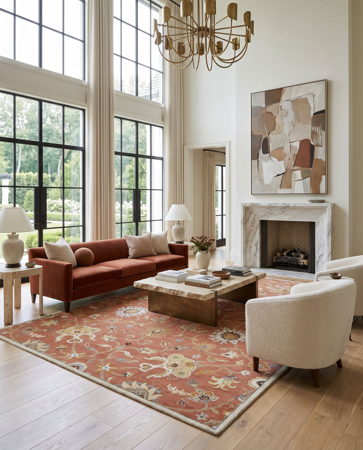 Solstice Hand Tufted Rug as the centerpiece of a bright luxury living room — a hand tufted traditional area rug in dusty pink, ivory, camel and sky blue tones