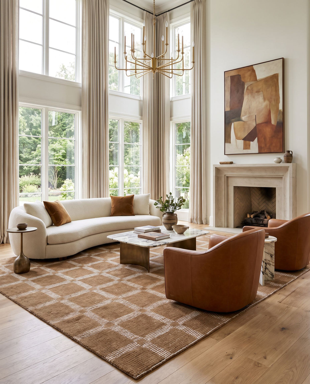 Solveig Hand Tufted Rug as the centerpiece of a bright luxury living room — a hand tufted modern area rug in taupe, ivory, camel and tan tones