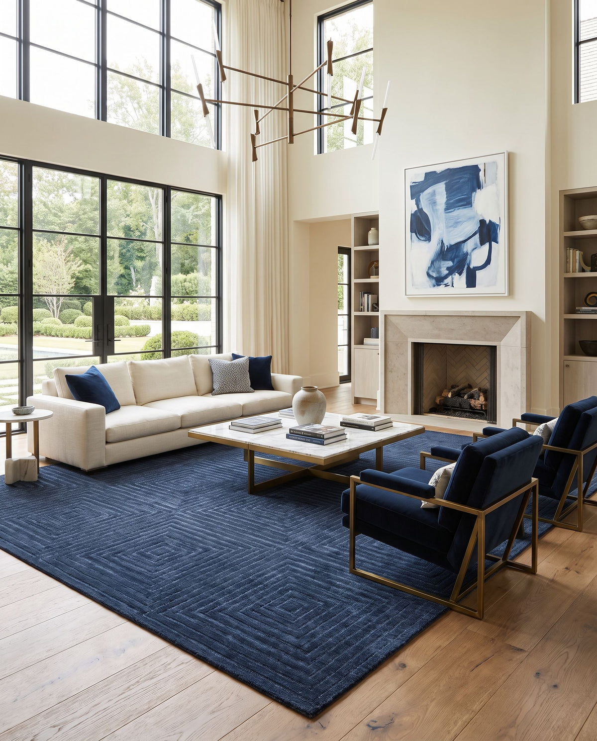 Samos Hand Tufted Rug as the centerpiece of a bright luxury living room — a hand tufted global area rug in warm neutral tones