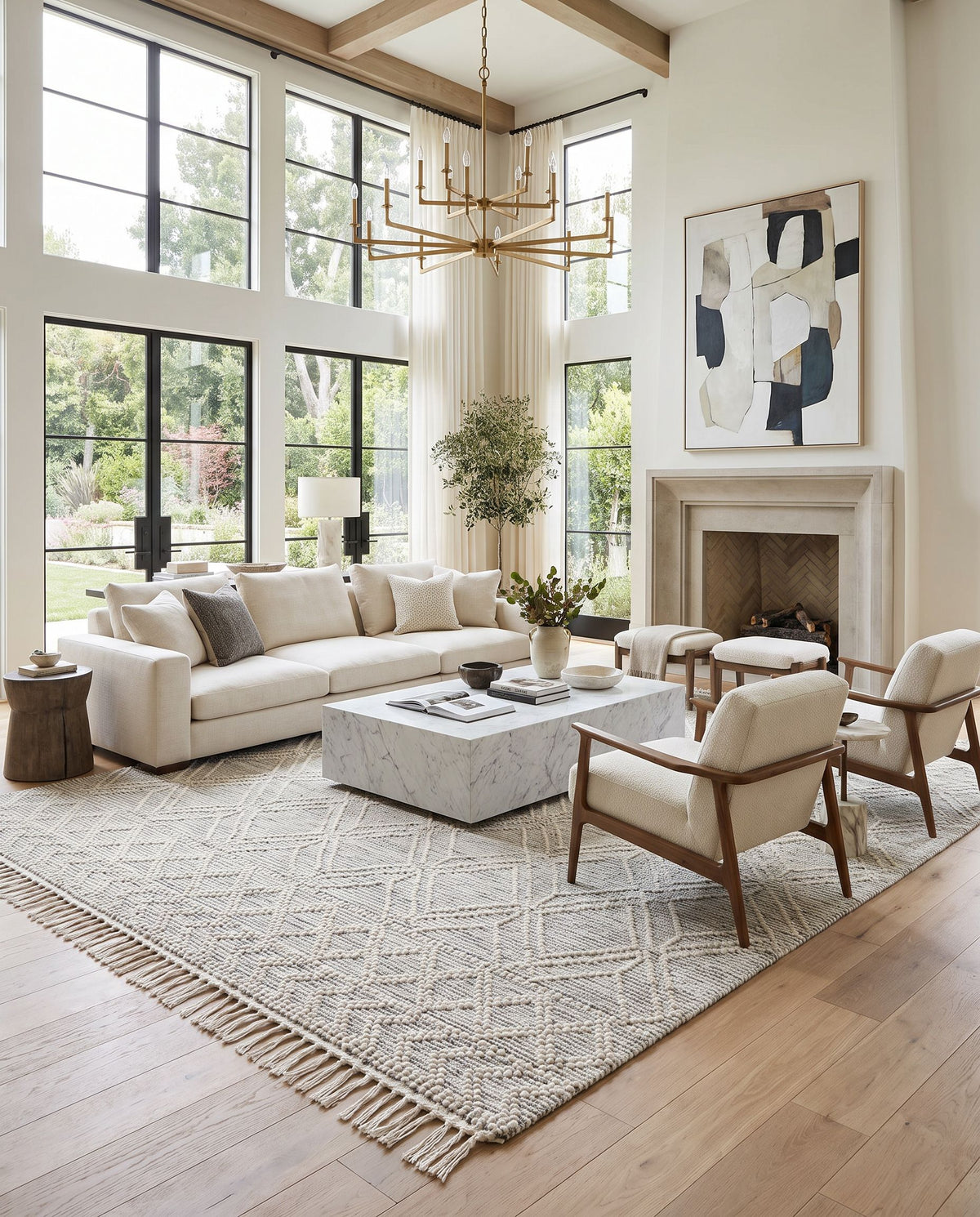Sestri Hand Woven Rug as the centerpiece of a bright luxury living room — a hand woven global area rug in cream and black tones