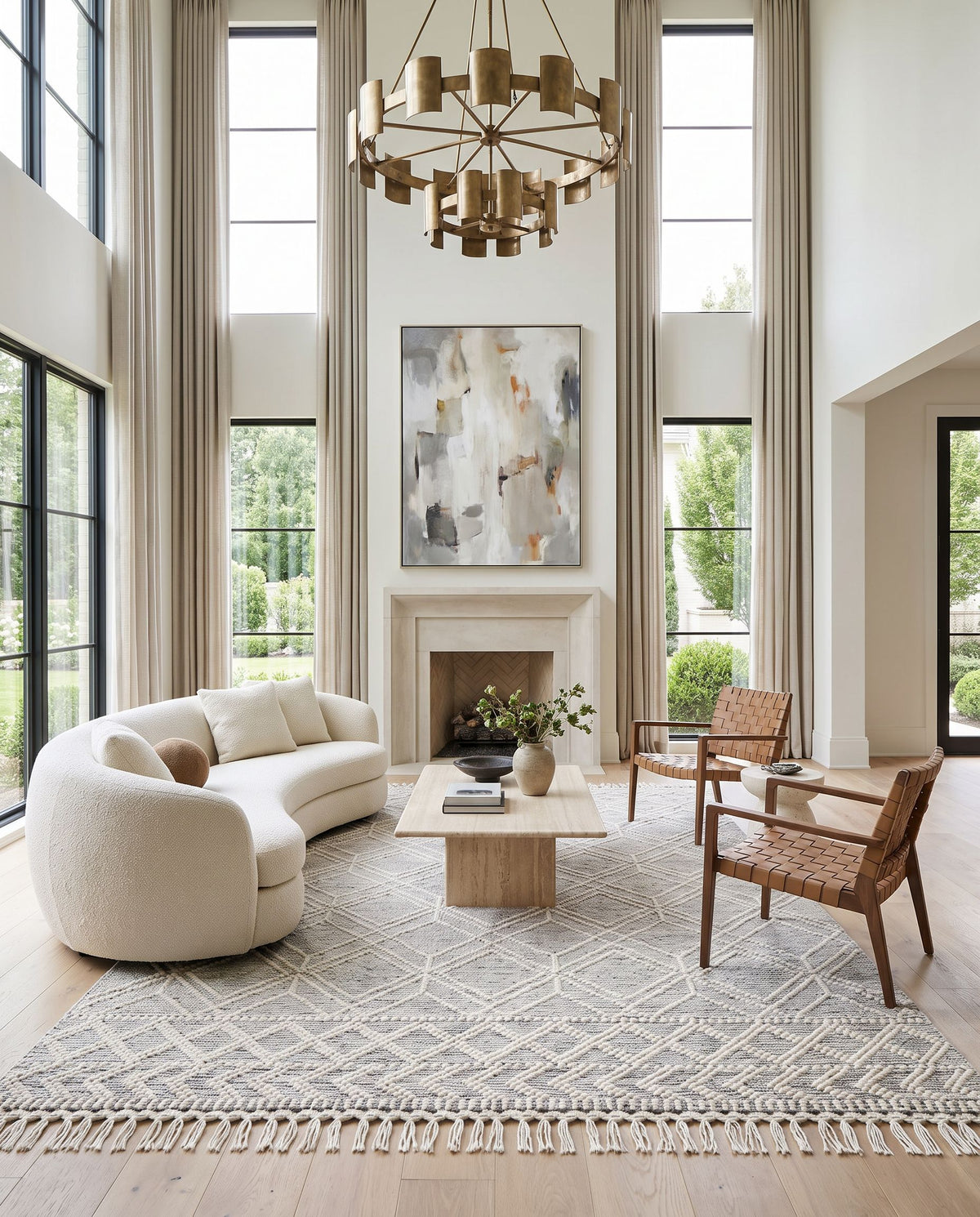 Sestri Hand Woven Rug styled in an elegant designer living room — hand woven global area rug in cream and black tones