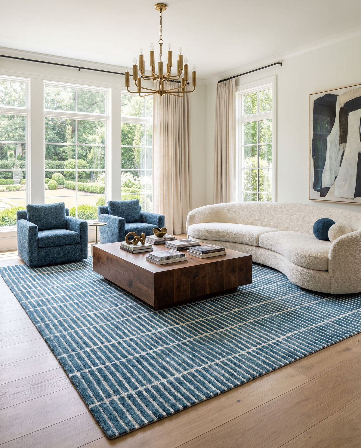 Tinos Hand Tufted Rug styled in an elegant designer living room — hand tufted modern area rug in warm neutral tones