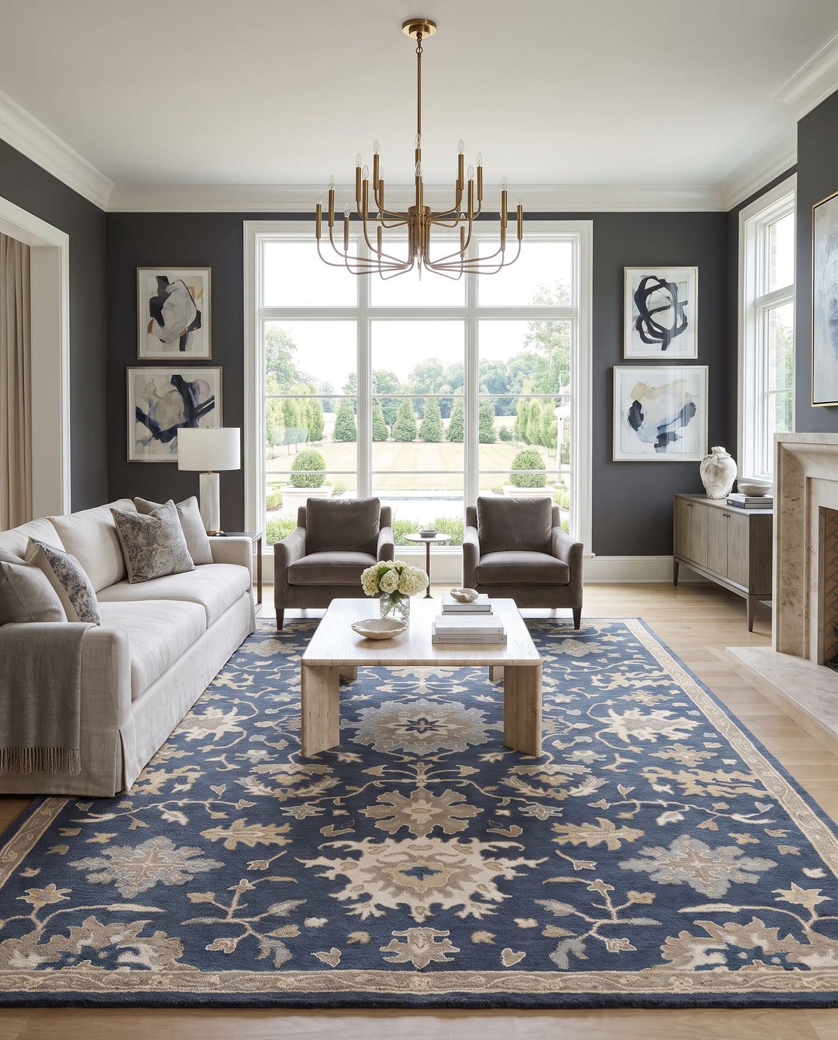 Viborg Hand Tufted Rug styled in an elegant designer living room — hand tufted traditional area rug in navy, brown, medium gray and light beige tones