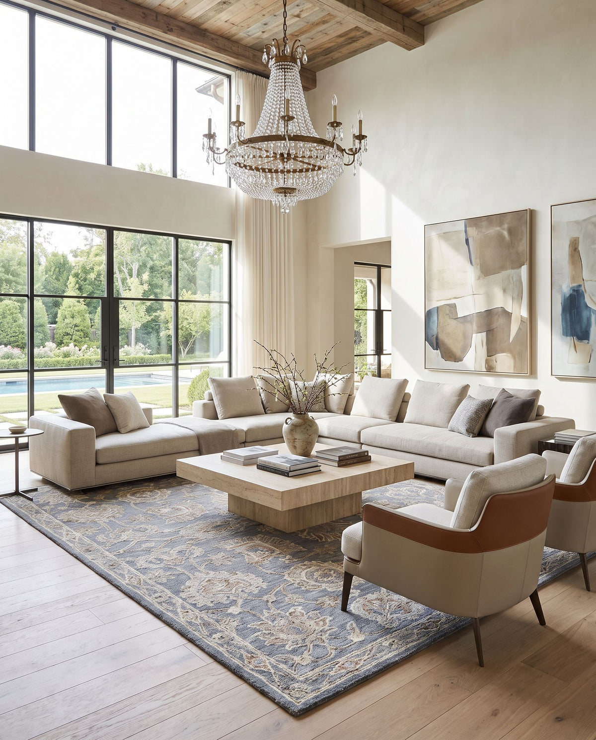 Visby Hand Tufted Rug styled in an elegant designer living room — hand tufted traditional area rug in slate gray, ivory, sandstone and taupe tones
