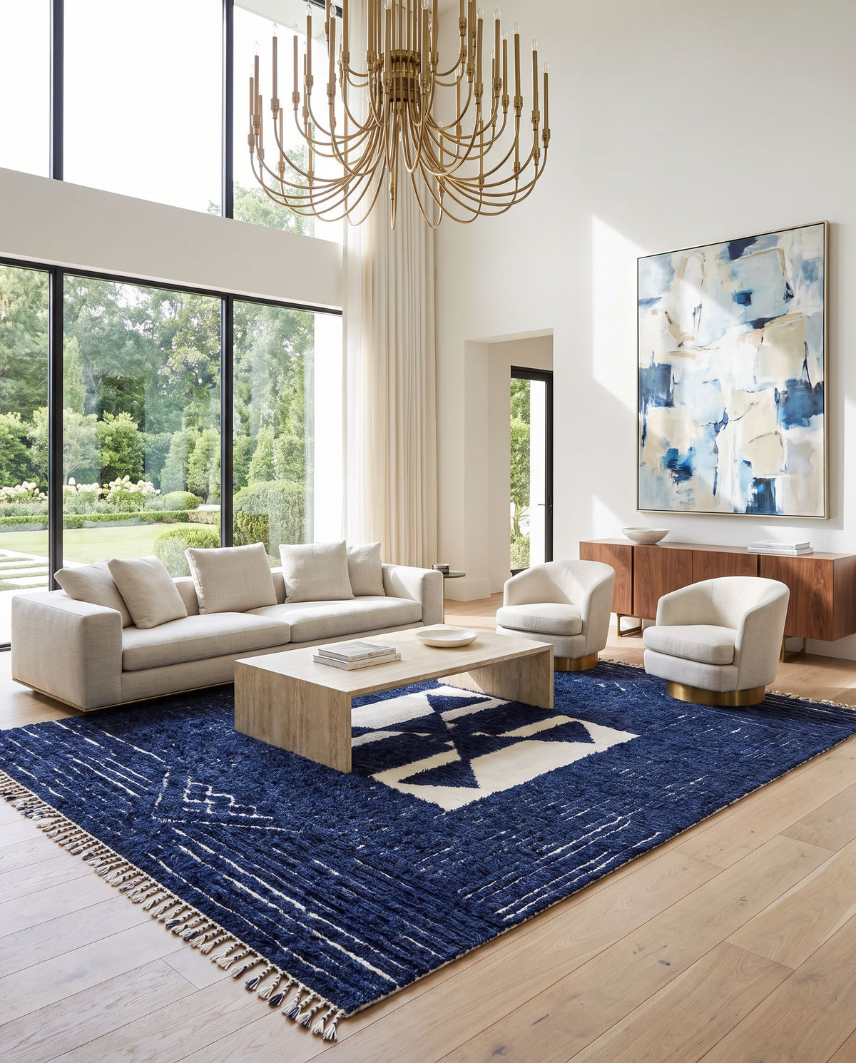 Sahara SAH-2303 Hand Knotted Rug as the centerpiece of a bright luxury living room — a hand knotted global area rug in cream and navy tones
