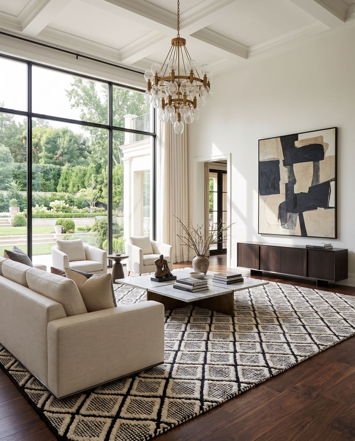 Santa Barbara SBB-2300 Hand Woven Rug as the centerpiece of a bright luxury living room — a hand woven global area rug in black and cream tones