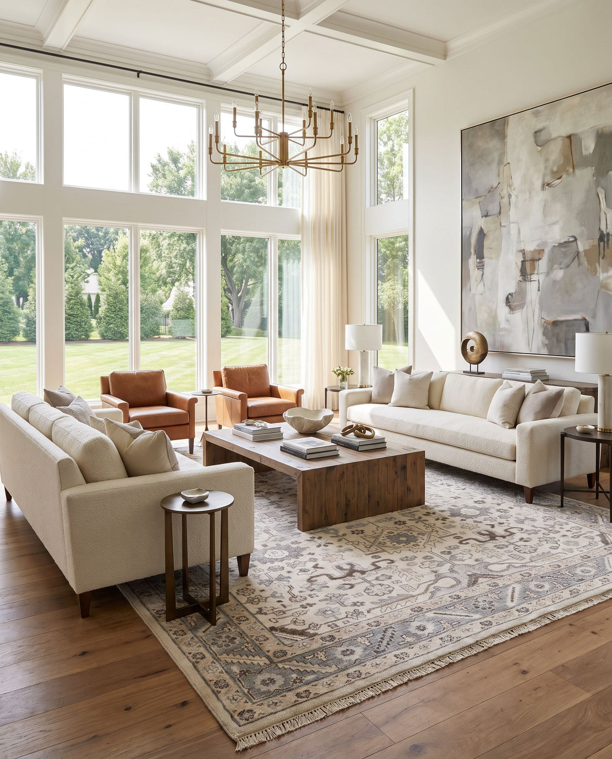 Sabine SBN-1001 Hand Knotted Rug as the centerpiece of a bright luxury living room — a hand knotted traditional area rug in light gray, beige, slate and gray tones